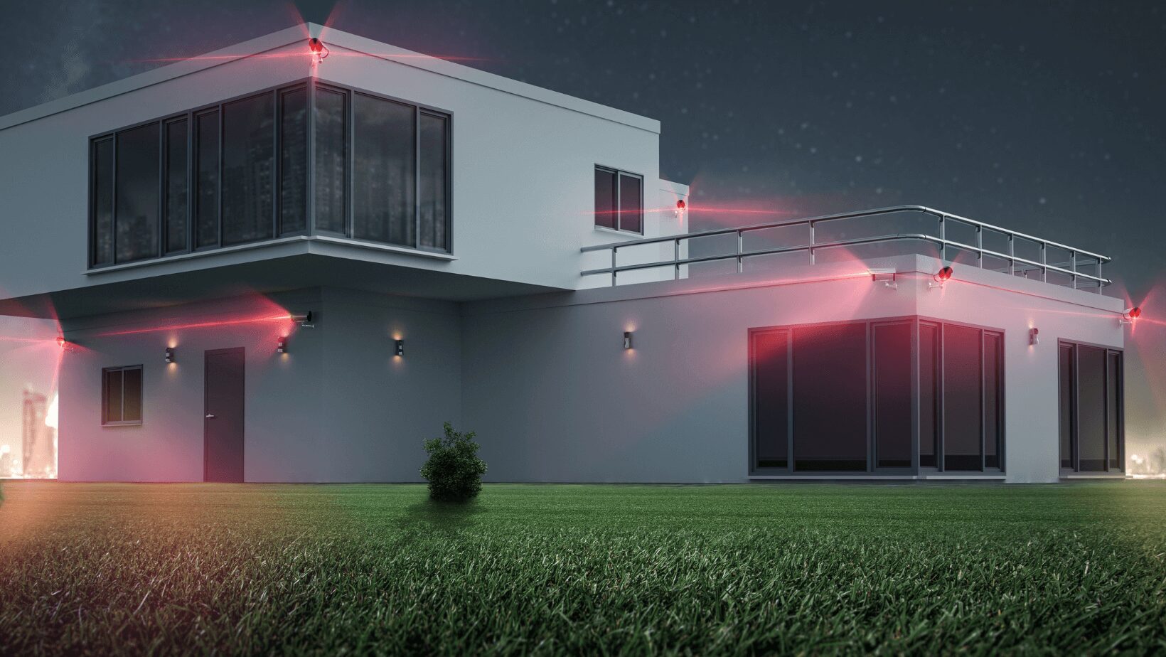 Modern home protected by security sensors at night